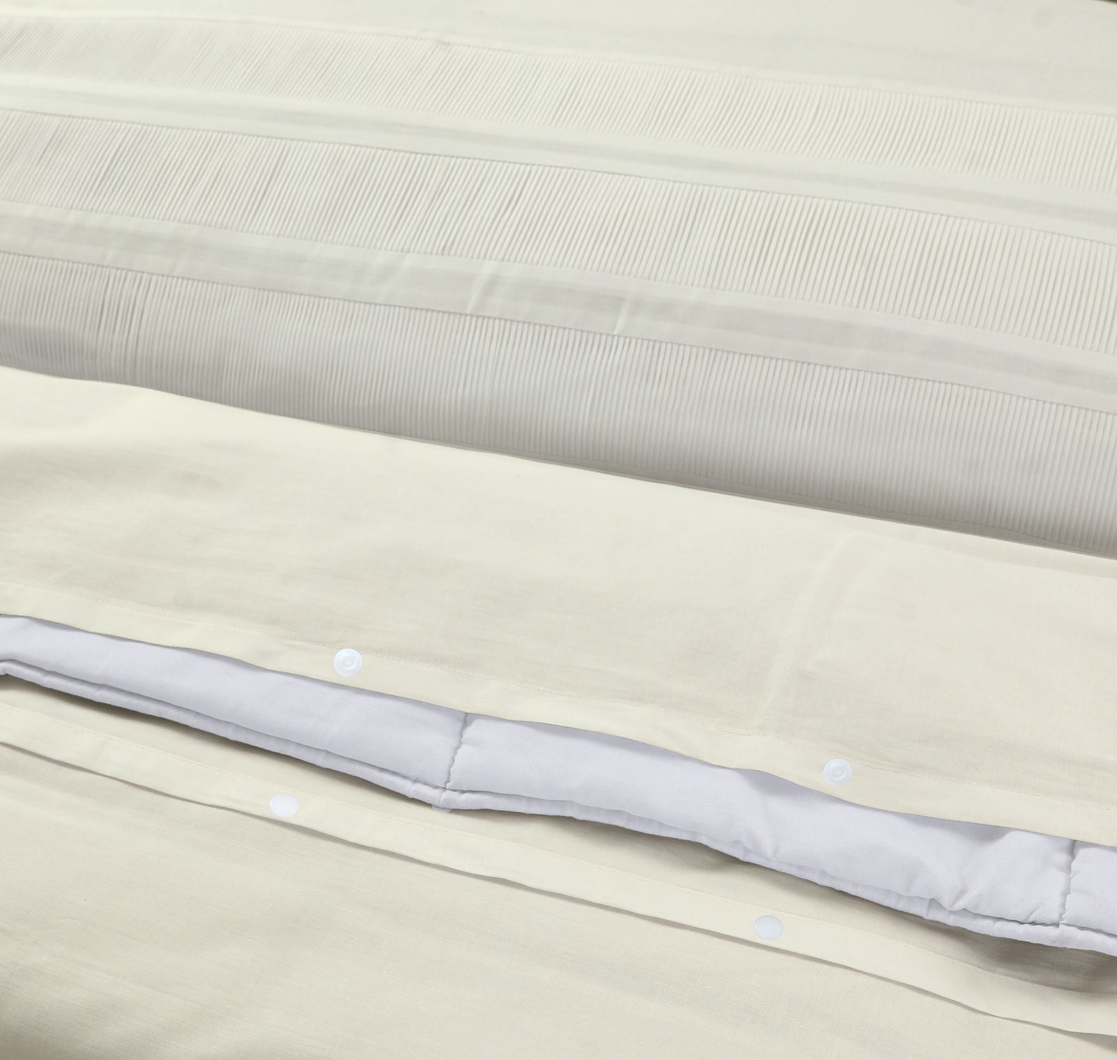 NordDream Bali percale pussilakana creme tyynyliinoilla